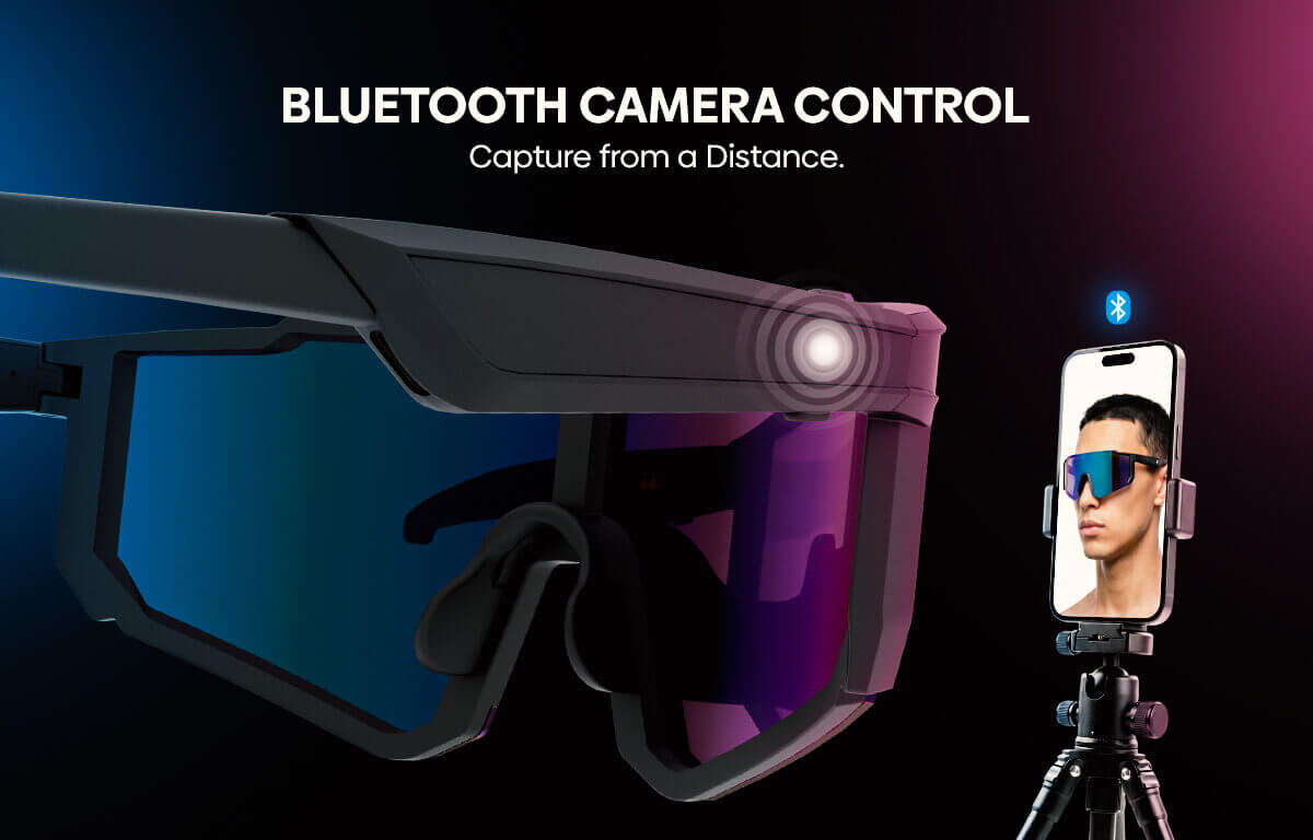 A pair of smart sport smart glasses, shown alongside a smartphone on a tripod displaying a live feed of a person wearing the sunglasses. The image features the text 'BLUETOOTH CAMERA CONTROL' at the top against a dark background with blue and pink lighting.