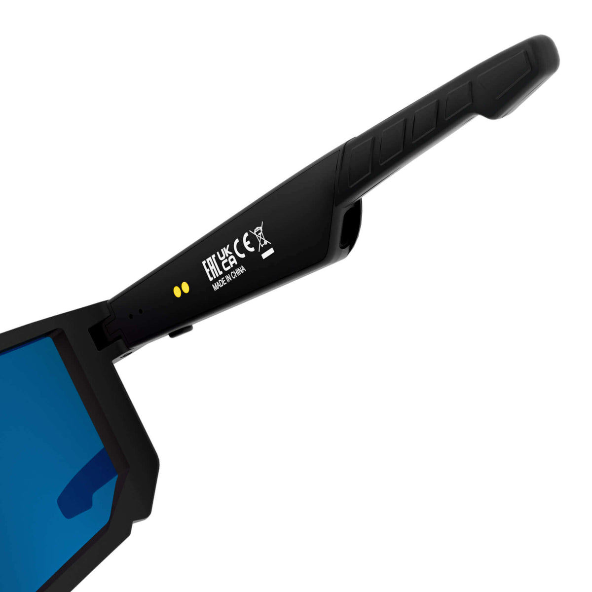 Close-up of the black temple arm of a pair of smart glasses with blue mirrored lenses, showing white printed text and symbols on the side.