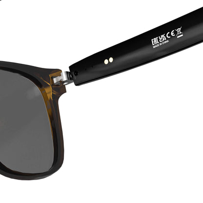 Close-up of a pair of smart glasses showing the temple arm and part of the dark lens, with white printed text on the black arm against a white background.