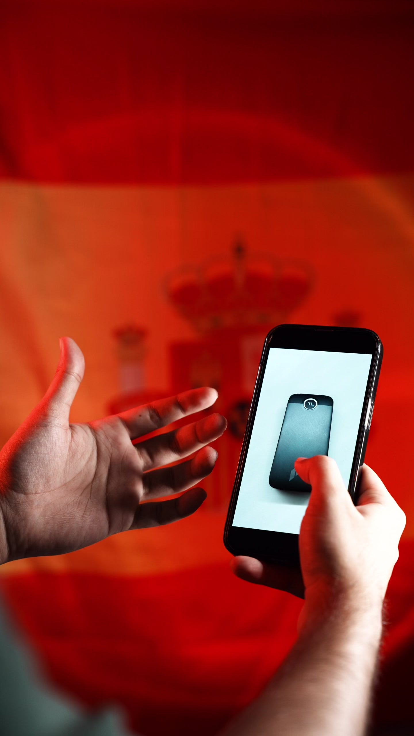 Load video: Five portable electronic devices in black and gray are displayed on dark pedestals against a warm orange gradient background with the text 'DESIGNED FOR THE FUTURE. BUILT FOR MORE.